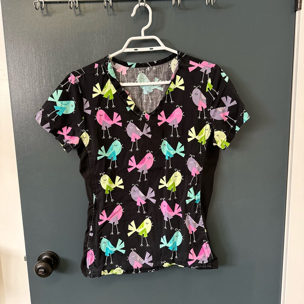 Two women’s scrub tops